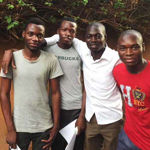 Isaac, Michel, Francis & Albert are Espoir Jeunes alumni. Now enrolled at Ouagadougu University they act as mentors to the children in Gaoua